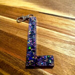 L accessory! Add to key ring or use as a bag clip!